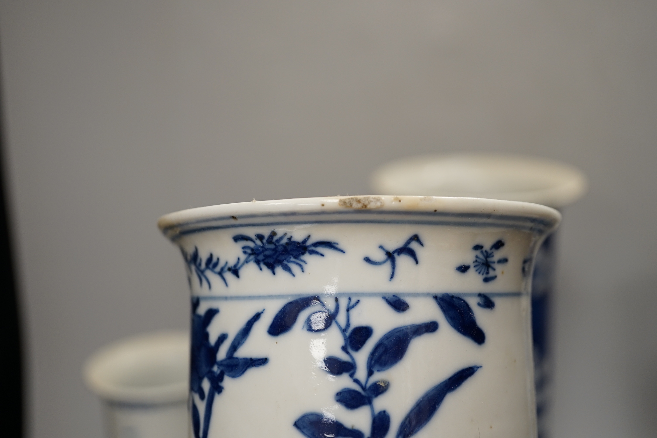 Nine assorted Chinese blue and white cylinder vases, 19th/20th century, tallest 30cm high (a.f.)